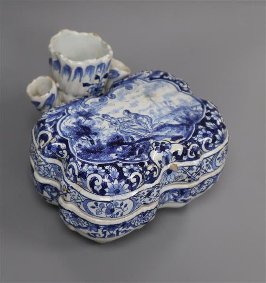 An 18th century Dutch Delft two-section blue and white ink pot and cover, H 8cm W 11cm